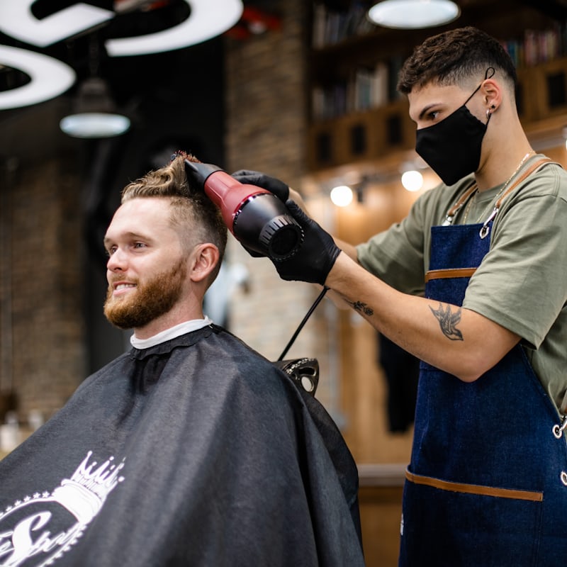 A precision scissor cut in progress at The Local Cut