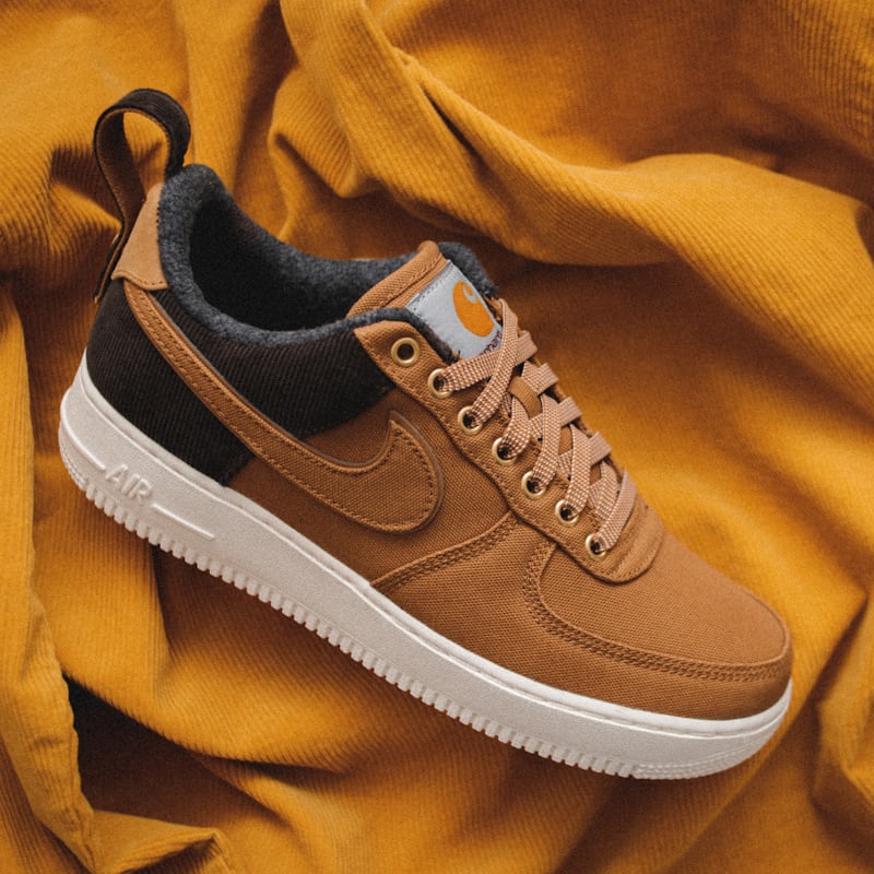Artisan hands at the bench with a well-loved sneaker